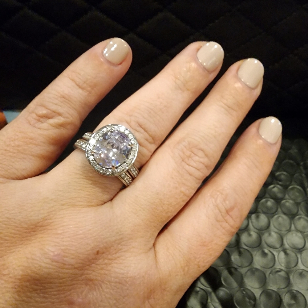 Stunning 6.48 TCW Oval CZ Zirconia Halo Bridal Set in Platinum